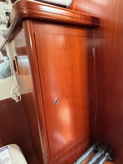 Windsome Yacht Photos Pics Wooden cabinet interior of 2006 Beneteau Oceanis 373 sailboat.