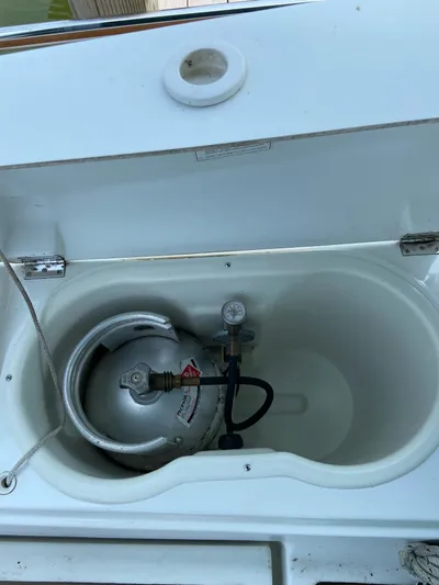 Windsome Yacht Photos Pics Propane tank compartment on a 2006 Beneteau Oceanis 373 sailboat.