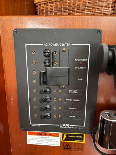 Windsome Yacht Photos Pics AC power center panel on a 2006 Beneteau Oceanis 373 sailboat.