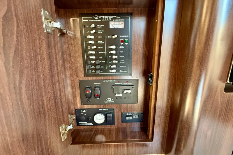 My Particular Harbor Yacht Photos Pics Control panel of 2018 Regal 28 Express boat with wood finish.