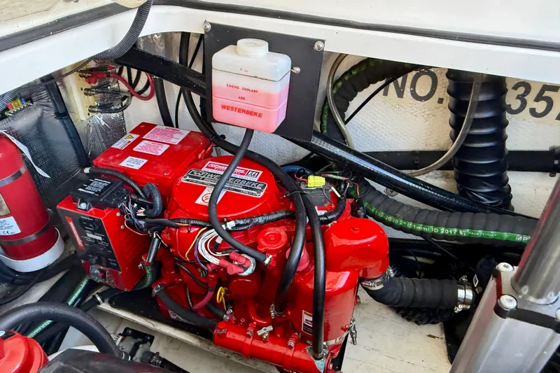 My Particular Harbor Yacht Photos Pics Engine compartment of 2018 Regal 28 Express with Westerbeke generator and coolant system.
