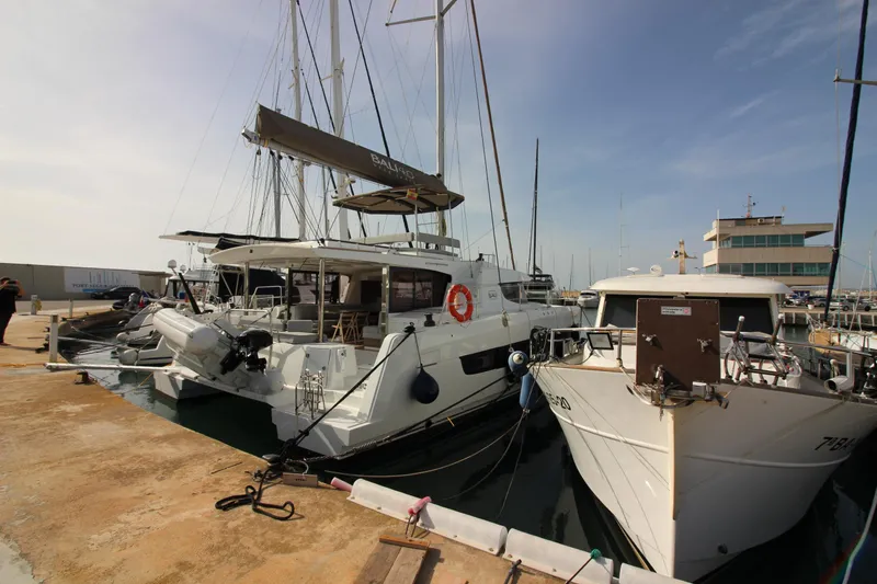  Yacht Photos Pics Bali 4.6 catamaran docked at marina, 2022 model, sunny day, clear sky.