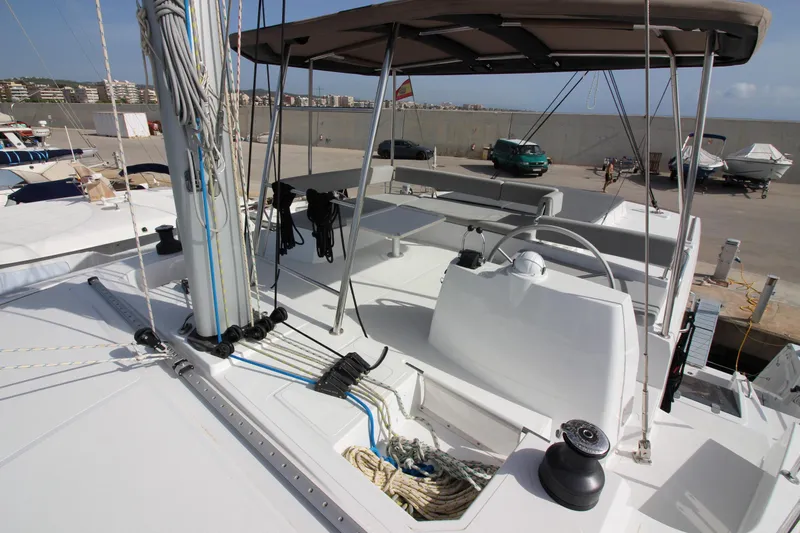  Yacht Photos Pics 2022 Bali 4.6 yacht deck with rigging and shaded seating area.