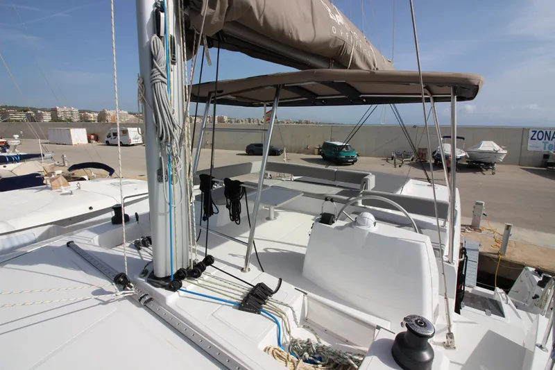 Yacht Photos Pics Bali 4.6 catamaran deck, 2022 model, docked at marina with clear sky.