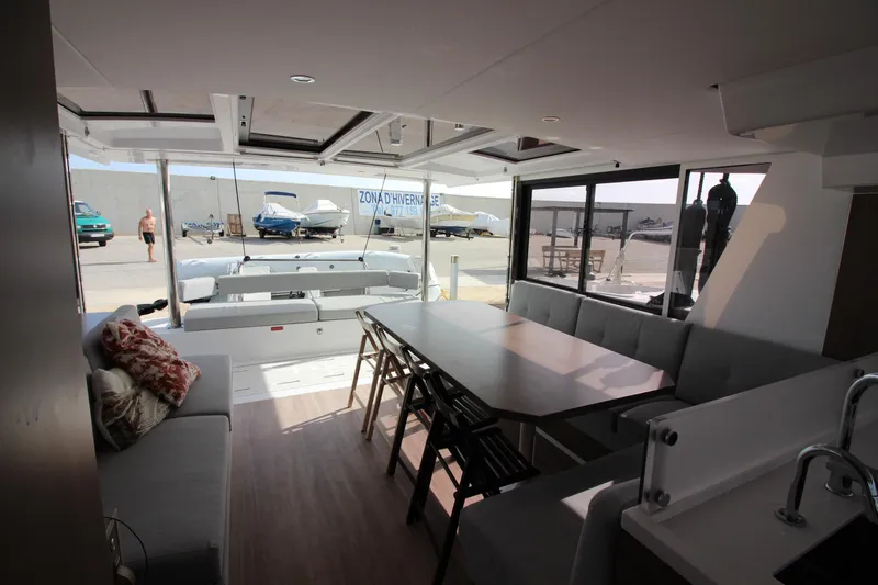  Yacht Photos Pics Interior of 2022 Bali 4.6 yacht with spacious seating and dining area.