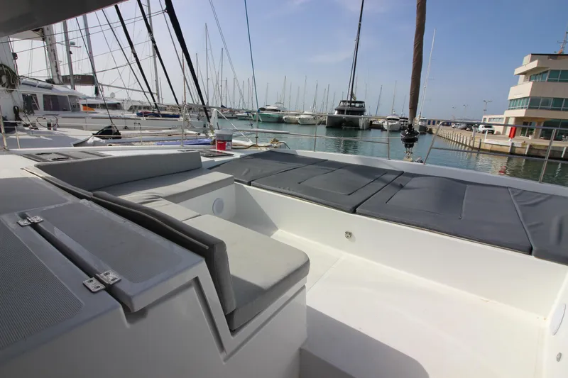  Yacht Photos Pics Spacious deck of 2022 Bali 4.6 yacht docked at marina with clear sky.