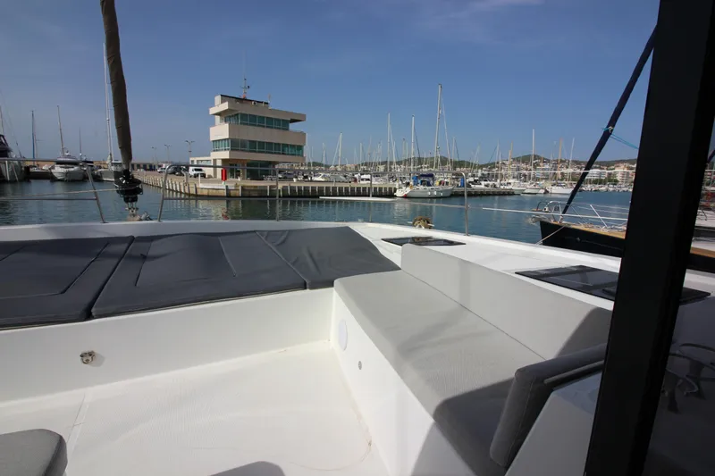  Yacht Photos Pics Luxurious Bali 4.6 yacht docked at marina, 2022 model, with spacious seating area.