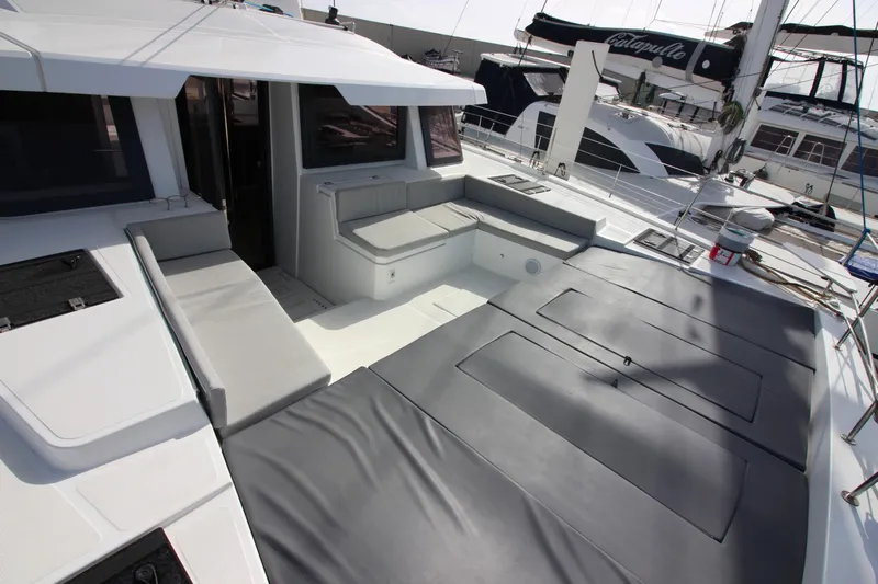  Yacht Photos Pics 2022 Bali 4.6 yacht deck with seating and sunbathing area.