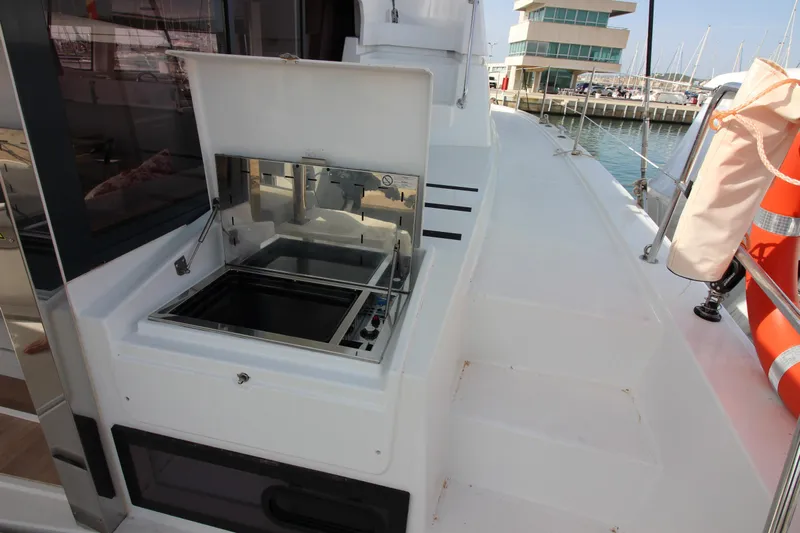  Yacht Photos Pics Bali 4.6 yacht deck with open grill, 2022 model, docked at marina.