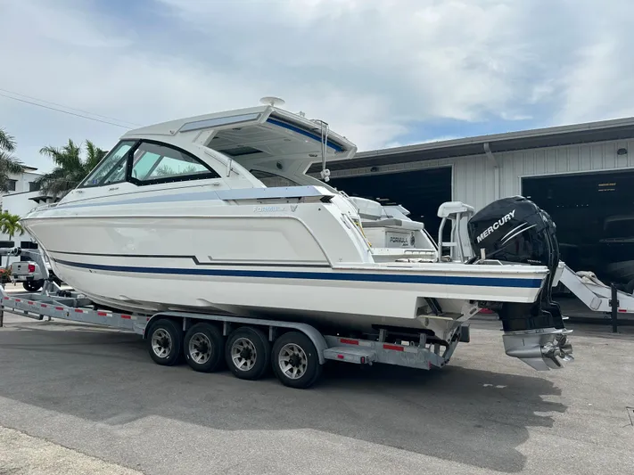  Yacht Photos Pics 2021 Formula 380 SSC boat on a trailer with Mercury outboard engines.