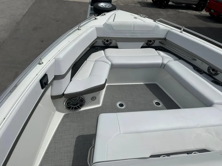  Yacht Photos Pics 2021 Formula 380 SSC boat interior with white seating and built-in speakers.