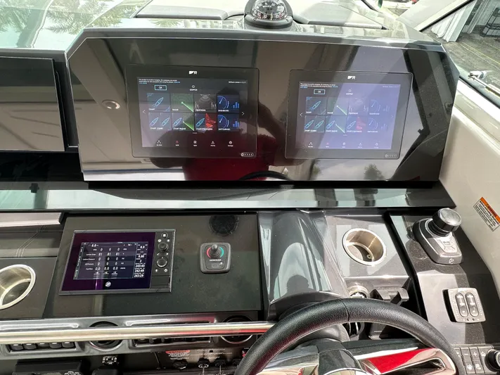  Yacht Photos Pics 2021 Formula 380 SSC dashboard with dual touchscreen displays and controls.