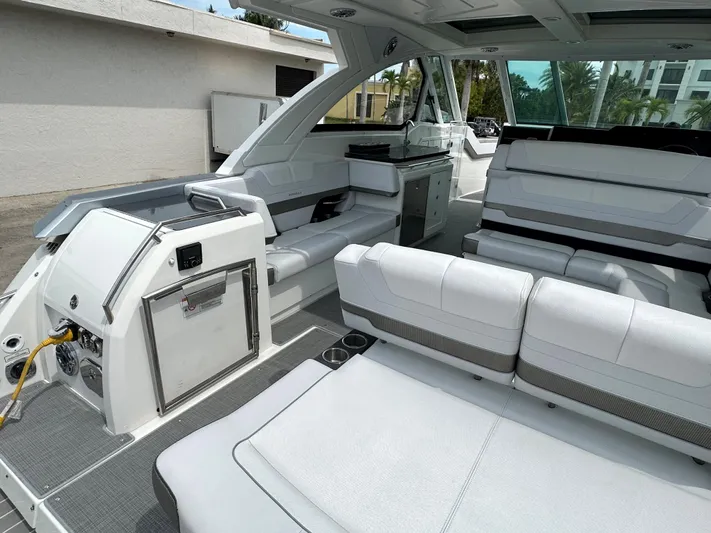  Yacht Photos Pics 2021 Formula 380 SSC boat interior with white seating and modern amenities.