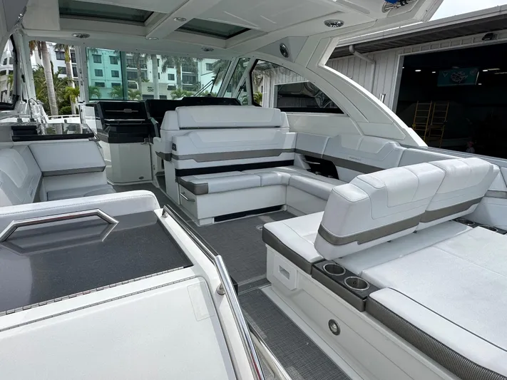  Yacht Photos Pics 2021 Formula 380 SSC luxury boat interior with white seating and modern design.