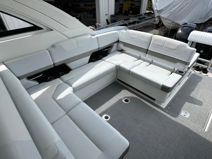  Yacht Photos Pics 2021 Formula 380 SSC boat interior with luxurious white seating.