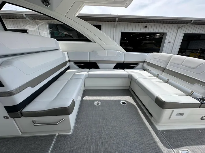  Yacht Photos Pics 2021 Formula 380 SSC boat interior with spacious white seating.