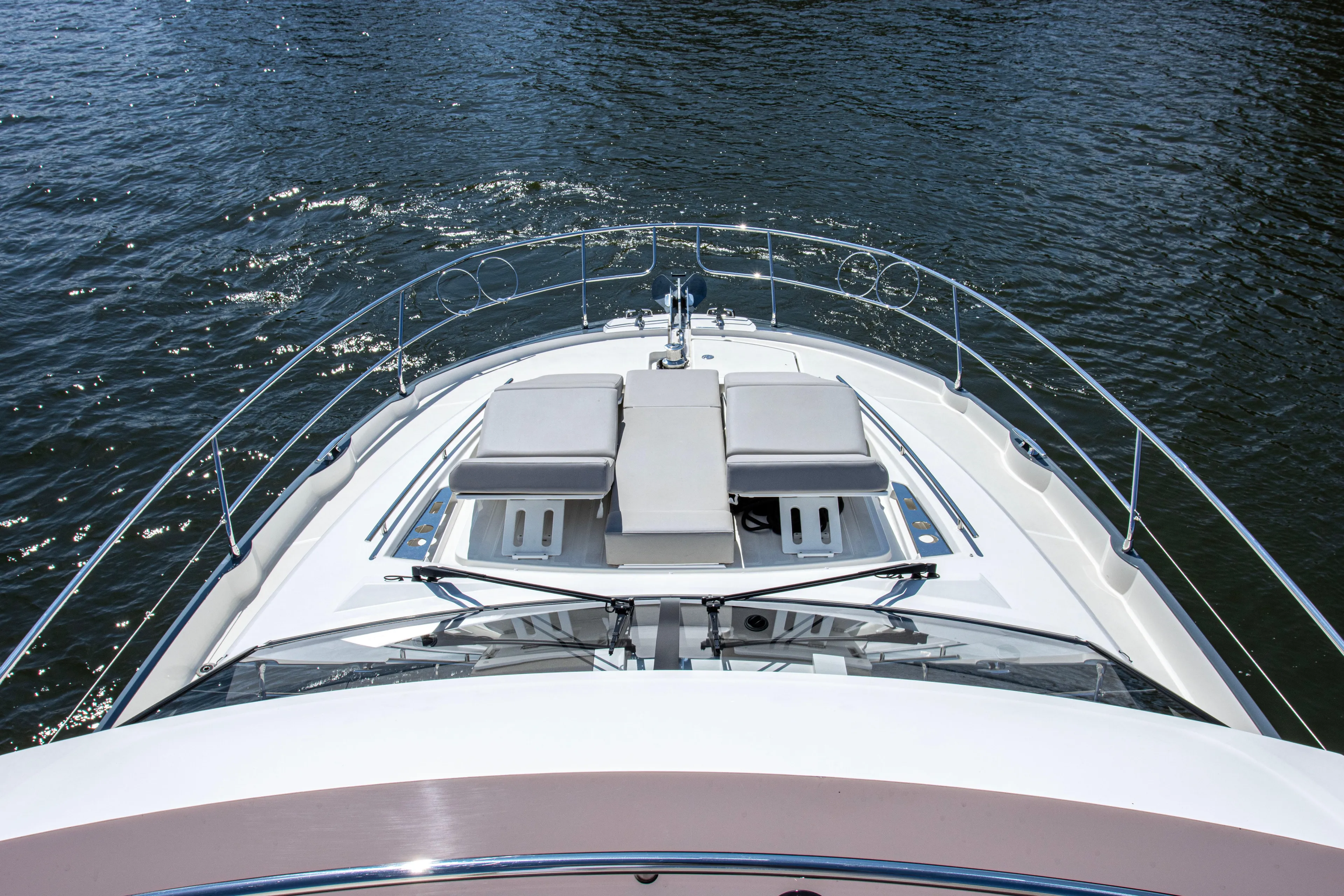  Yacht Photos Pics Prestige 520 yacht bow view, 2021 model, cruising on open water.