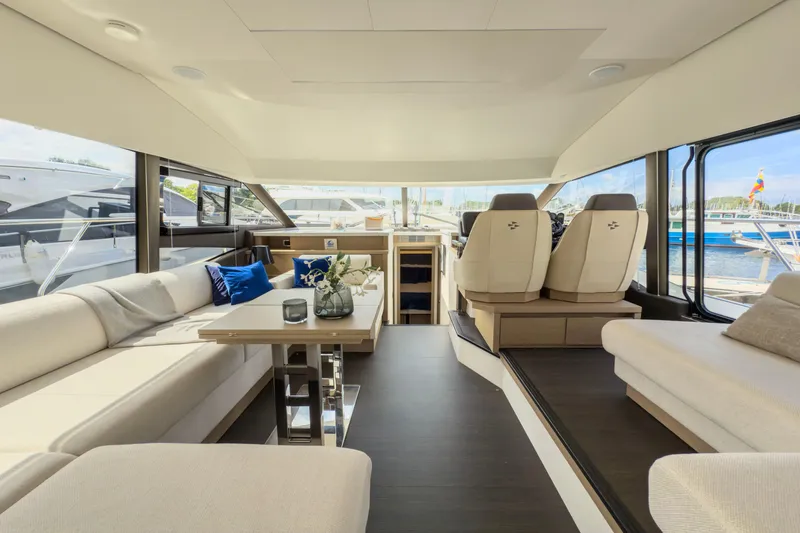  Yacht Photos Pics Luxurious interior of 2021 Prestige 520 yacht with elegant seating and modern design.