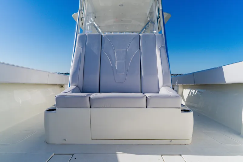 Yacht Photos Pics 2012 SeaVee 390B boat seating with sleek design under clear blue sky.