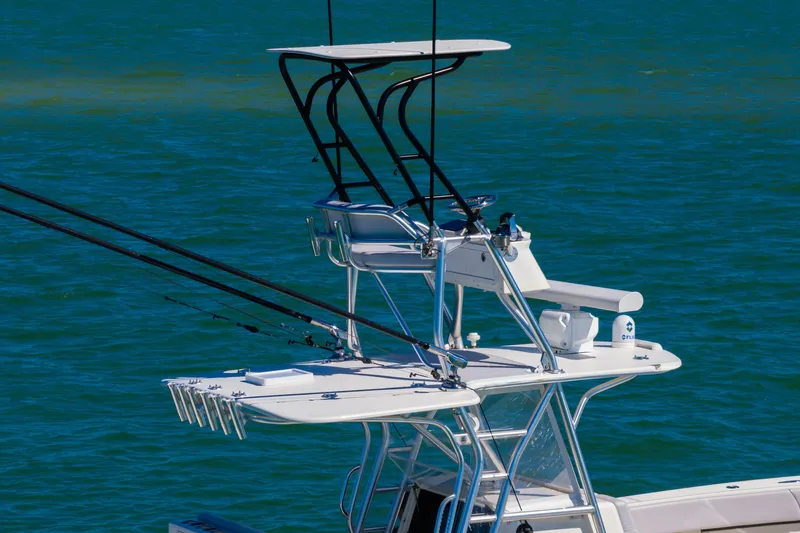  Yacht Photos Pics SeaVee 390B 2012 boat with fishing tower on blue water.