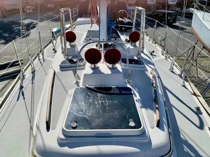 Circa Tempo Yacht Photos Pics Sailboat deck of 1991 Mason 44, featuring hatches and rigging.