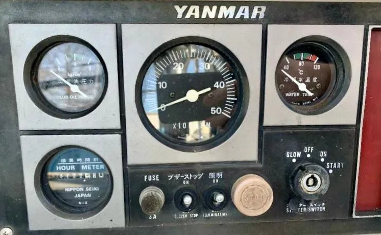 Circa Tempo Yacht Photos Pics ```json{  "alt_text": "Yanmar engine control panel with gauges and switches, Mason 44, 1991 model."}```