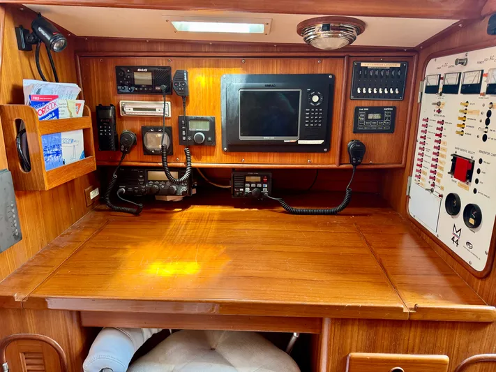 Circa Tempo Yacht Photos Pics Navigation station with communication equipment in a 1991 Mason 44 yacht.