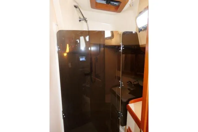 C Otter Yacht Photos Pics Interior of 2002 Tartan 3700 yacht featuring a modern shower area.