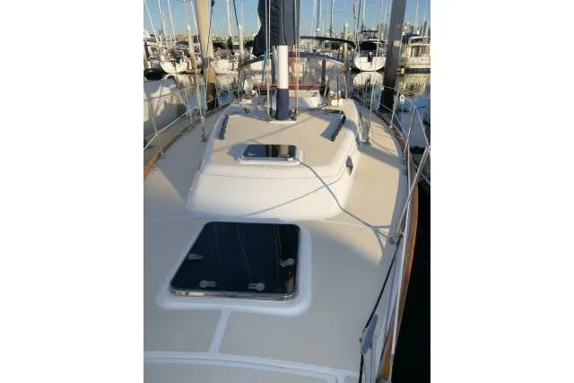 C Otter Yacht Photos Pics 2002 Tartan 3700 sailboat deck view in marina setting.