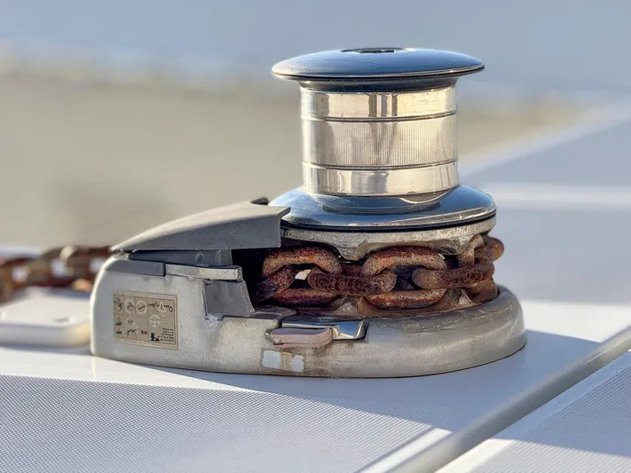 Blue Pearl Too Yacht Photos Pics Anchor windlass on a 2017 Lagoon 42 catamaran with rusty chain.