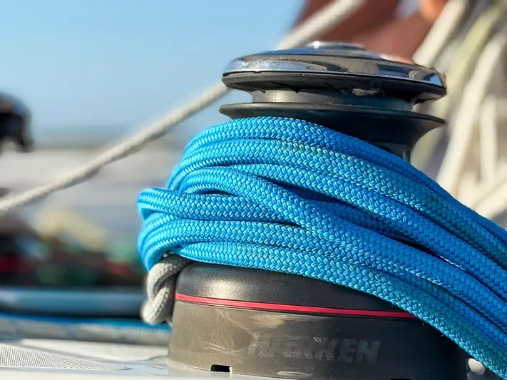 Blue Pearl Too Yacht Photos Pics Close-up of a winch with blue rope on a 2017 Lagoon 42 sailboat.