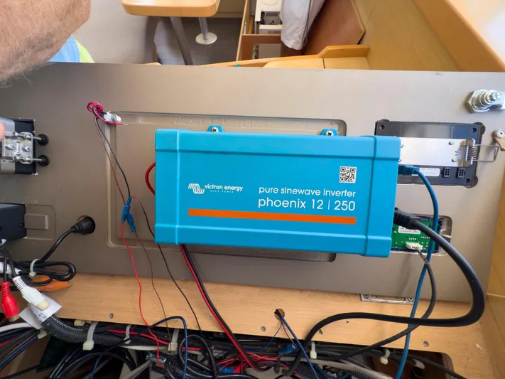 Blue Pearl Too Yacht Photos Pics Victron Energy inverter installation on 2017 Lagoon 42 yacht, showcasing wiring and setup.