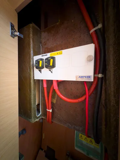 Blue Pearl Too Yacht Photos Pics Electrical panel with red and black cables in a 2017 Lagoon 42 boat.