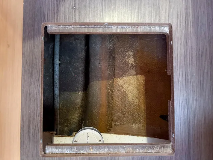 Blue Pearl Too Yacht Photos Pics Access panel on Lagoon 42 catamaran, revealing interior components and wiring.