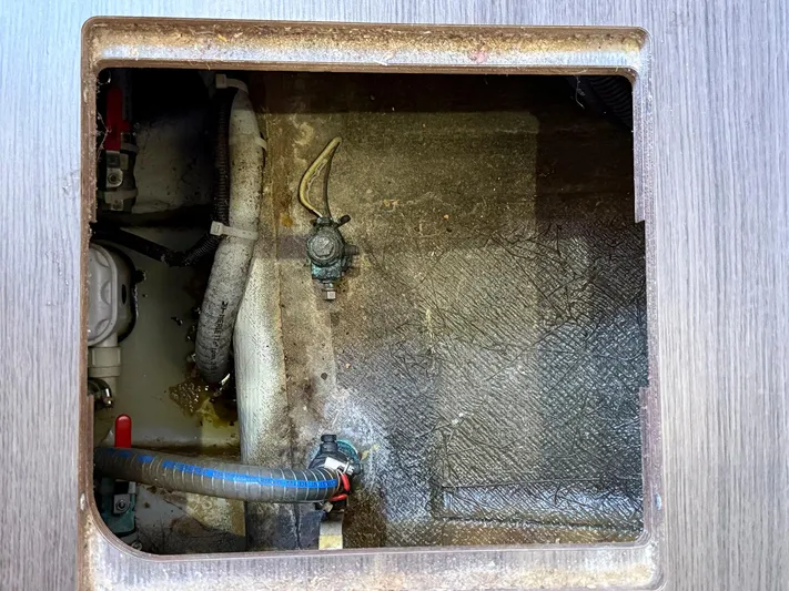 Blue Pearl Too Yacht Photos Pics Bilge compartment of a 2017 Lagoon 42 catamaran with visible hoses and fittings.