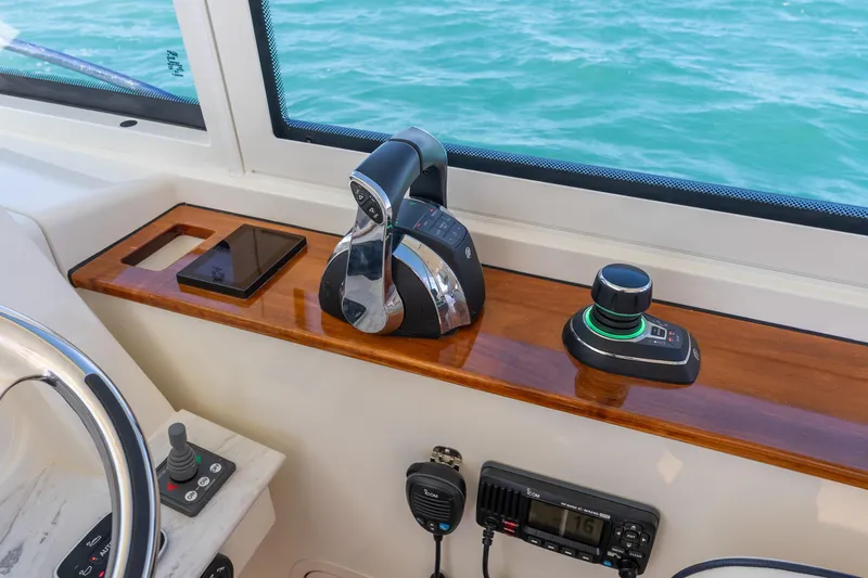 Jenny B Yacht Photos Pics Hinckley Sport Boat 40 X 2021 helm with controls and navigation equipment.