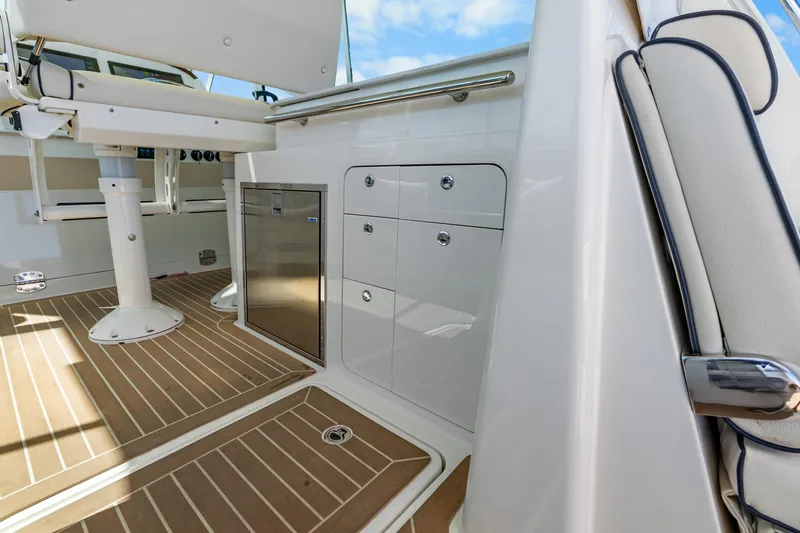 Jenny B Yacht Photos Pics 2021 Hinckley Sport Boat 40 X interior with sleek cabinetry and modern design.