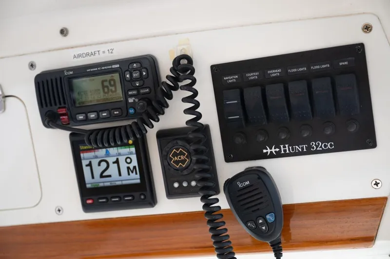 Minnow Yacht Photos Pics Control panel of 2016 Hunt Yachts 32 Center Console with navigation and communication equipment.