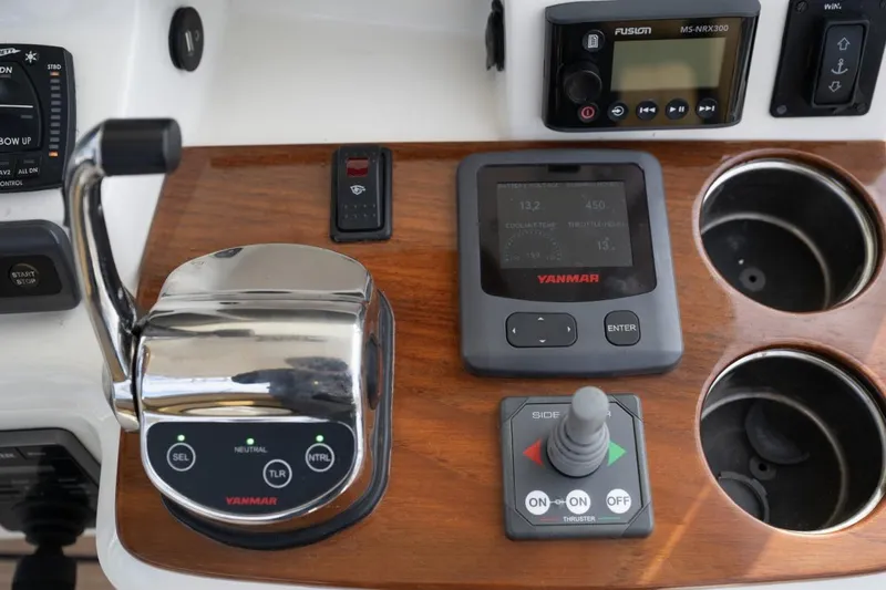 Minnow Yacht Photos Pics Control panel of 2016 Hunt Yachts 32 Center Console with Yanmar throttle and joystick.