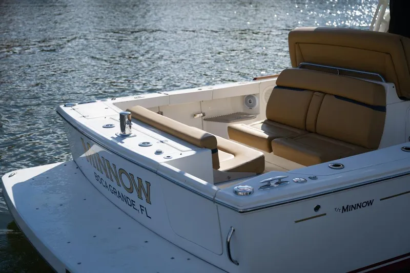 Minnow Yacht Photos Pics 2016 Hunt Yachts 32 Center Console boat with tan seating, docked in Boca Grande, FL.