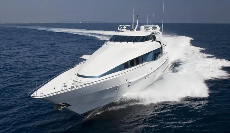 Moonraker Yacht Photos Pics Luxurious 1992 Norship Motoryacht cruising swiftly on open sea.