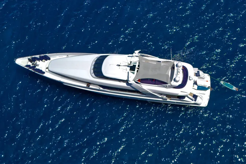Moonraker Yacht Photos Pics Aerial view of a 1992 Norship Motoryacht on blue ocean waters.