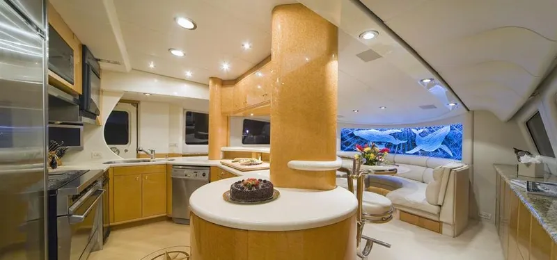 Moonraker Yacht Photos Pics Luxurious 1992 Norship Motoryacht interior with modern kitchen and elegant dining area.