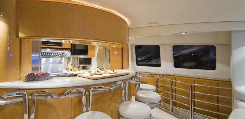 Moonraker Yacht Photos Pics Luxurious interior of a 1992 Norship Motoryacht with modern kitchen and seating area.
