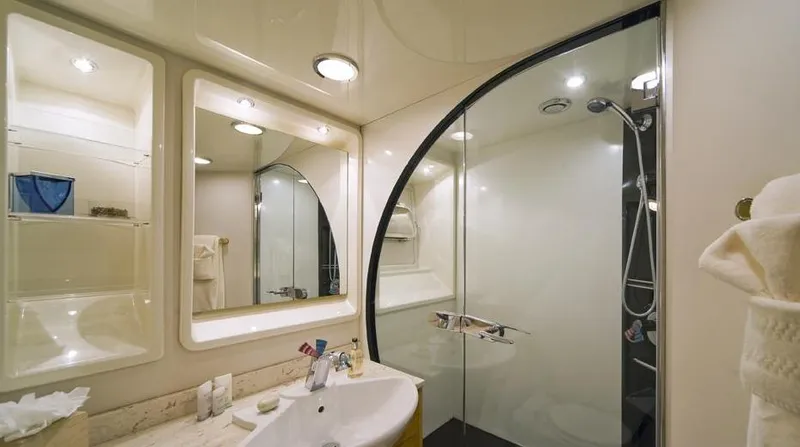 Moonraker Yacht Photos Pics Luxurious bathroom in a 1992 Norship Motoryacht with modern fixtures and elegant design.