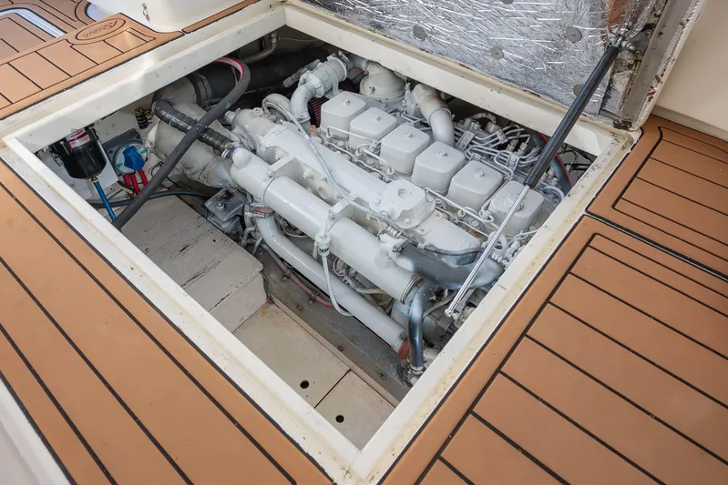 Moby Yacht Photos Pics Engine compartment of 1987 Custom Carolina Island Boatworks 34 Express, showcasing detailed mechanics.