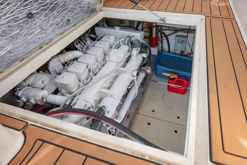 Moby Yacht Photos Pics Engine compartment of 1987 Custom Carolina Island Boatworks 34 Express, showcasing detailed machinery.