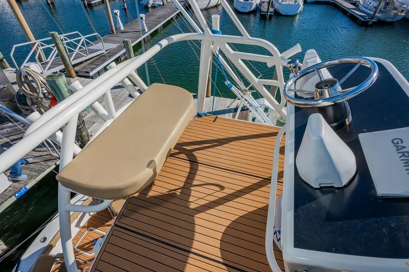 Moby Yacht Photos Pics Upper deck view of 1987 Custom Carolina Island Boatworks 34 Express at marina.