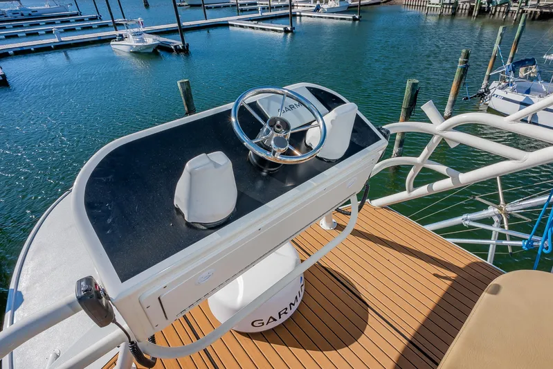 Moby Yacht Photos Pics Helm of 1987 Custom Carolina Island Boatworks 34 Express at marina.
