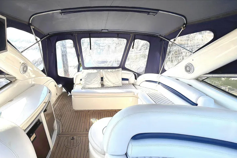  Yacht Photos Pics Luxurious interior of 2002 Sunseeker Camargue 44 yacht with plush seating and elegant design.